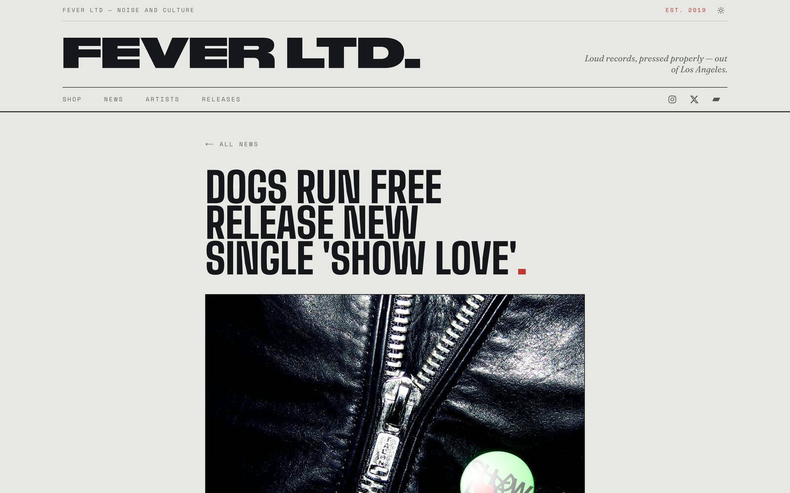 News article — a single dispatch announcing Dogs Run Free's “Show Love,” with heavy display type.